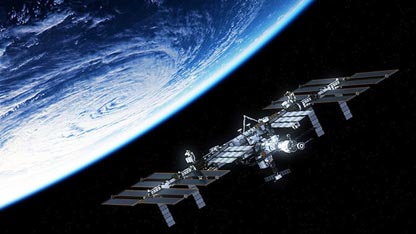 View of space station with earth in the background