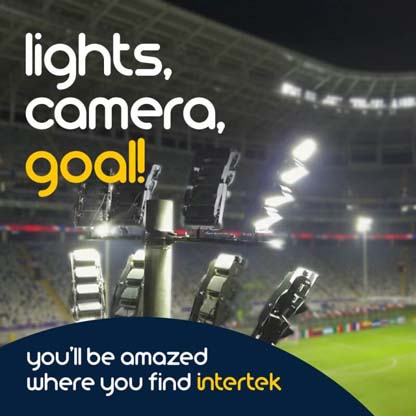 A group of lights at a large sports arena